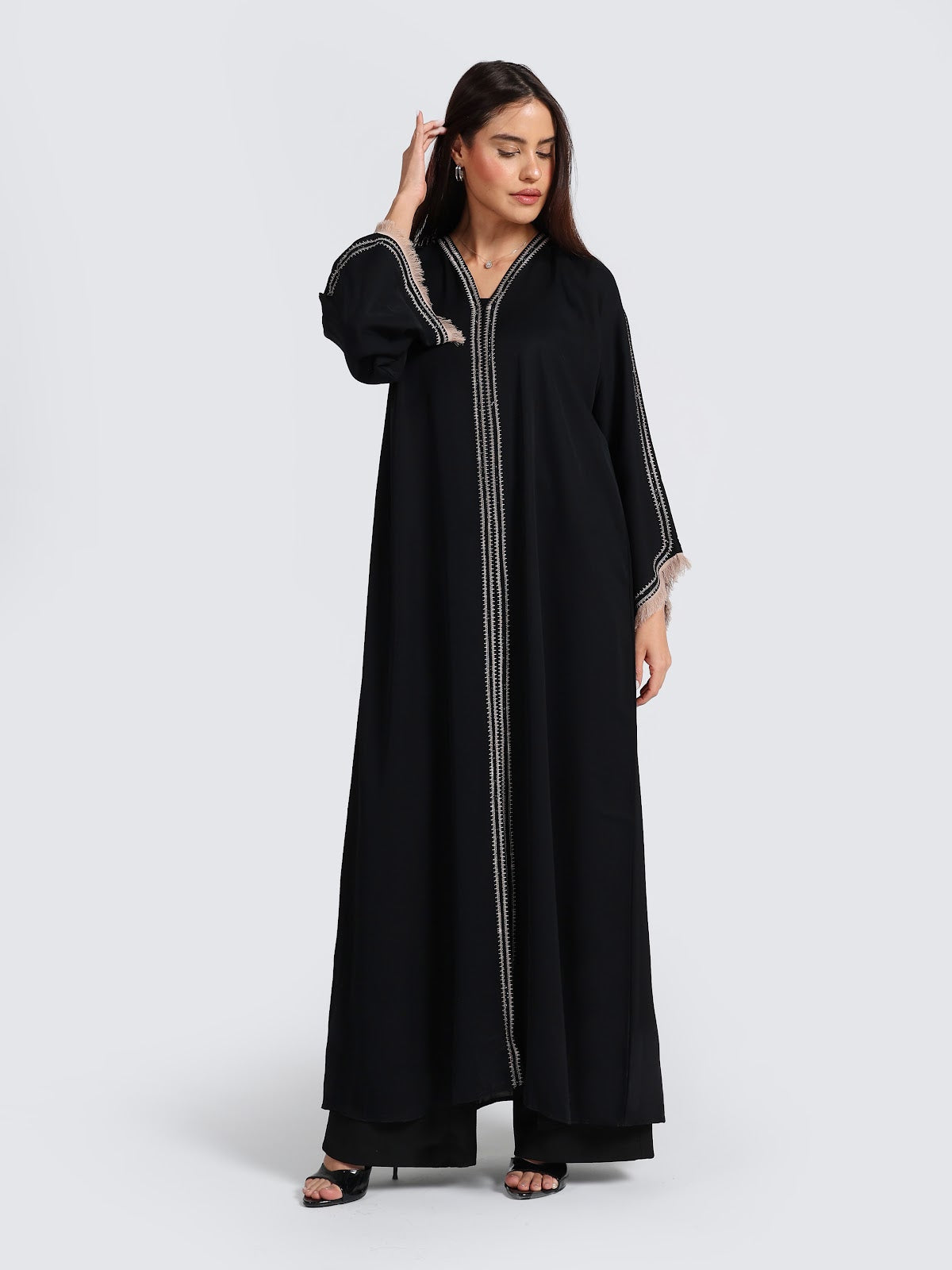 Sophisticated Black Abaya with White Contrast Stitching & Fringed Cuffs