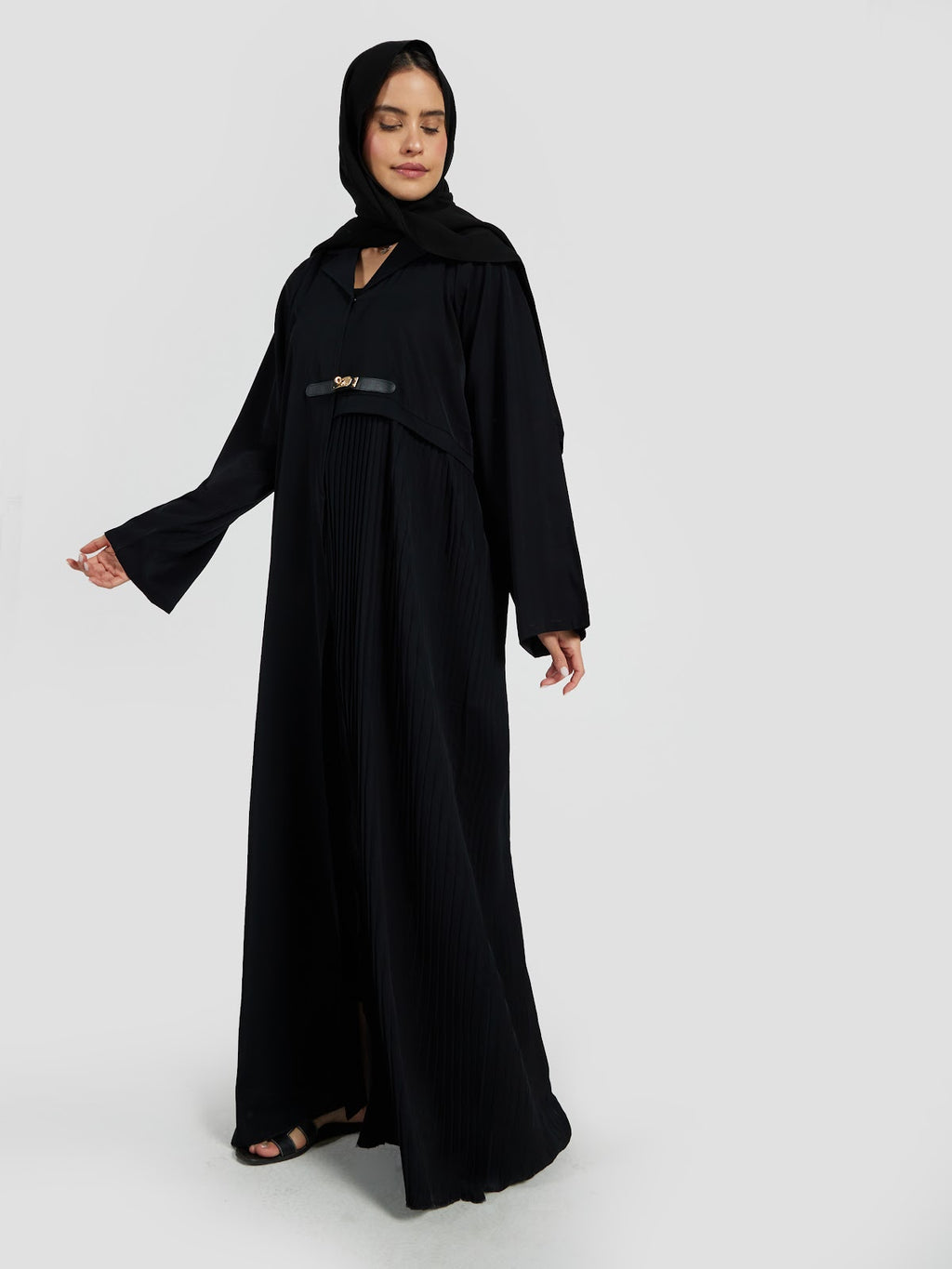Sophisticated Black Pleated Abaya with Gold Buckle Accent